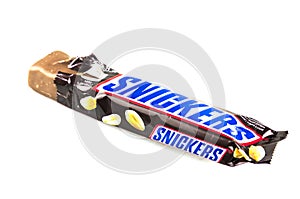 Closeup of unwrapped Snickers candy chocolate