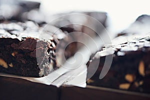 Closeup up of tasty chocolate brownies sitting on a table