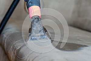 Closeup of upholstered Sofa chemical cleaning