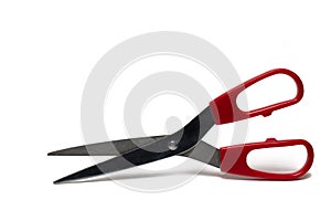 Closeup used scissors red handles white background