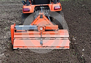 Closeup of Utility Tractor's Tiller Attachment