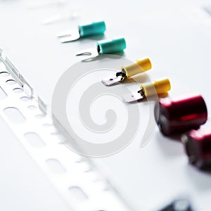 Closeup of various capacitors on white background