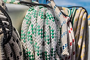 Closeup of various colored ropes of a sailing ship