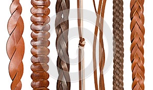 Closeup of various leather belts photo