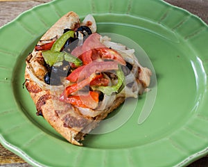 Closeup on vegetarian pizza slice