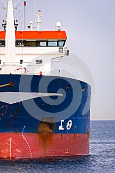 Front view of a small tanker ship.