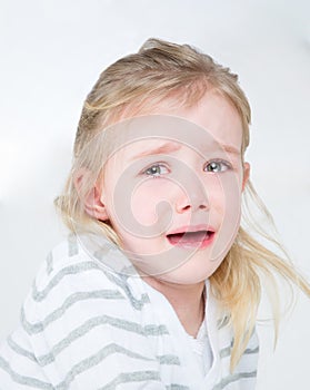 Closeup of very sad young girl