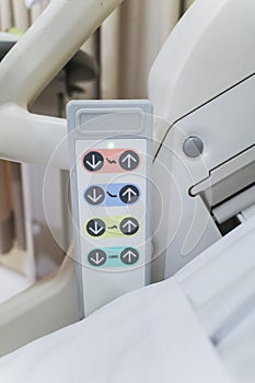 Closeup view of adjustable hospital bed control panel