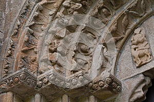 Closeup view of archivolts and capitals in the romanesque monatery of Carboeiro photo