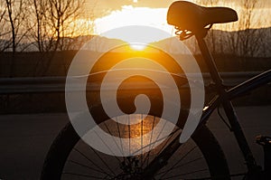 Closeup view of bike and sunsets