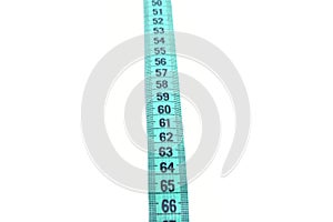 Closeup view of blue measuring tape isolated over white background