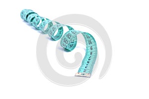 Closeup view of blue measuring tape isolated over white background