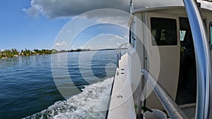 A closeup view of a boat wake going at high speed