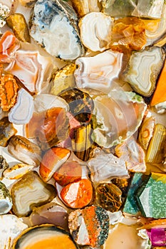 Closeup view of bright cut and polished minerals in the water