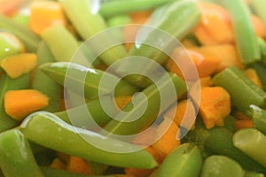 Closeup view of chopped beans and carrot