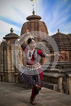 Closeup view of Classical Indian Odissi dance posing at Mukteshvara temple.