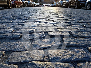 Closeup view of cobblestone street texture in the Tribeca neighborhood of New York City