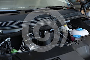 Closeup view of engine bay in auto