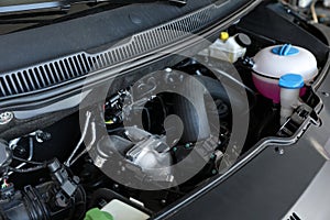 Closeup view of engine bay in auto