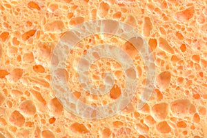 Closeup view of face cleaning sponge in light yellow color.