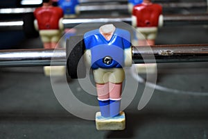 Closeup view of football table soccer . sport team football red and blue players