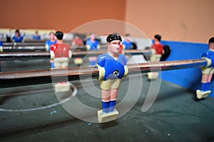 Closeup view of football table soccer . sport team football red and blue players