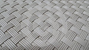 Closeup view of grey color plastic woven stripes