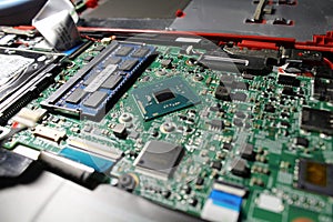 Closeup view at laptop motherboard and components