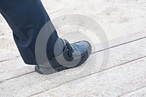 closeup view of man's leather black shoes,Businessman walking to the office