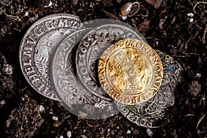 Closeup view of medieval European gold and silver coins.Old Polish coins.Zygmunt III Waza.Ancient gold and silver coins.