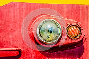 Closeup view of an old locomotive headlight. Minimalistic photography.