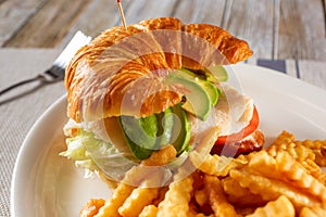 avocado turkey croissant sandwich