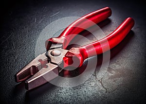 Closeup View of RedHandled Pliers A Precision Engineering Tool Ideal for Fine Work and Detailed Tasks