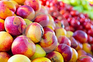 Closeup view on ripe nectarines on grocery store