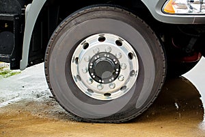 Closeup view of a rubber tire on a truck.Truck Wheels and Tires Closeup Photo.