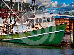 Closeup view of a rusting and abandoned fishing trawler