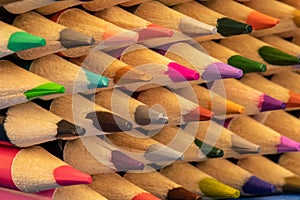 Closeup view of sharpened pencils in rows.