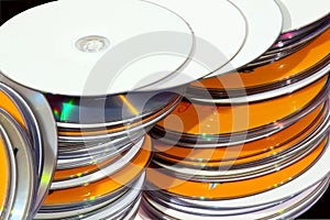 Closeup View of Stacked Colorful Compact Disks