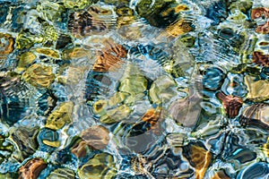 Closeup view on underwater various colorful stones in Georgian bay, Lake Huron, Ontario, Canada