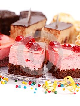 Closeup view of various creamy cakes