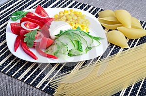 Closeup view of a vegetarian dish of raw vegetables