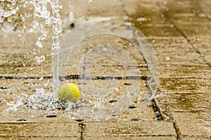 Closeup view on water splash fountain. Liquid motion spray.