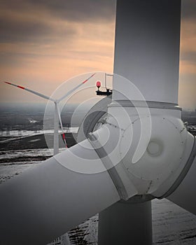Closeup view of Wind Turbines on Windmill Energy Farm