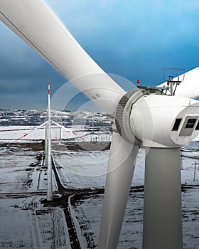 Closeup view of Wind Turbines on Windmill Energy Farm