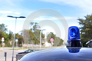 Closeup of vintage blue roof light siren of a police car in Norway