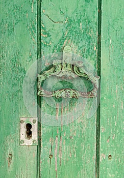 Closeup vintage door lock of external antique wooden door of Country house