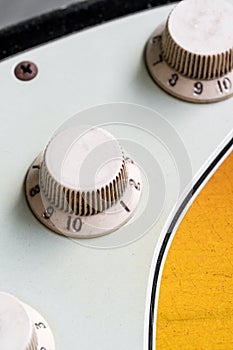Closeup of vintage electric guitar knobs