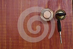 Closeup, vintage red wooden cabinet background with key