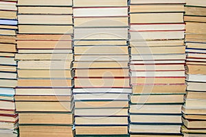 Closeup the wall of books on library shelves