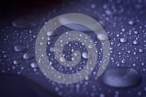 Closeup water condensation on gray background. Waterdrops, dew drops. Selected focus, sparkles and shining